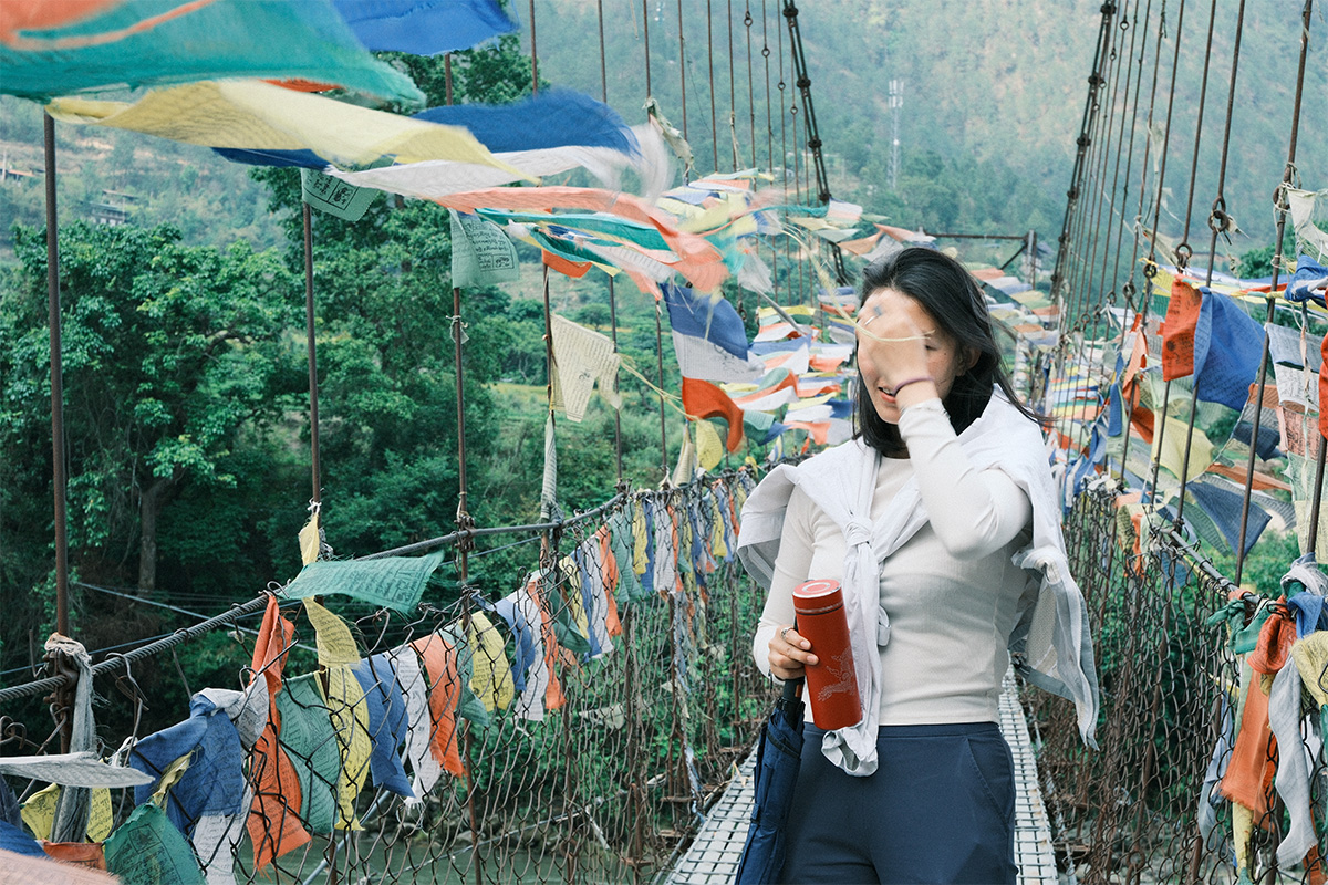 Suspension bridge with prayer flags